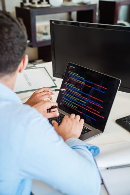 Fraud investigator organising digital evidence including messages, bank statements and screenshots